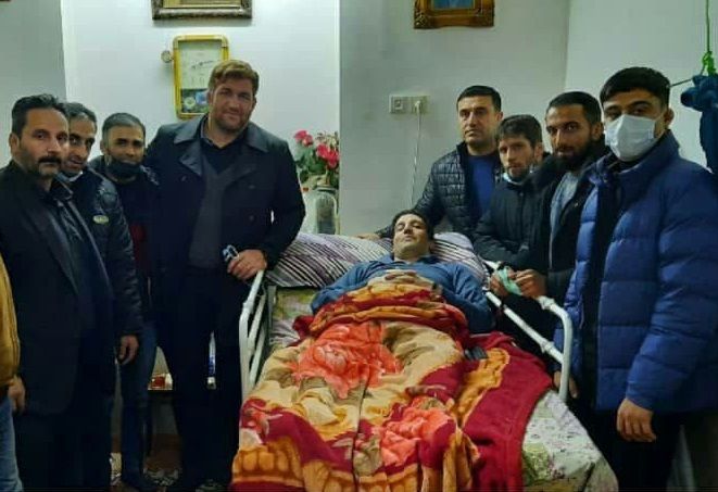 عیادت پهلوان هادی از کشتی‌گیر قطع نخاعی و پیشکسوت سردرودی