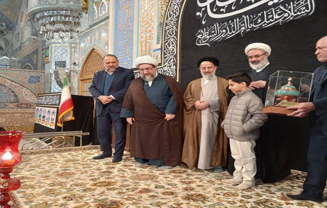 تجلیل از خانواده شهید مالک رحمتی